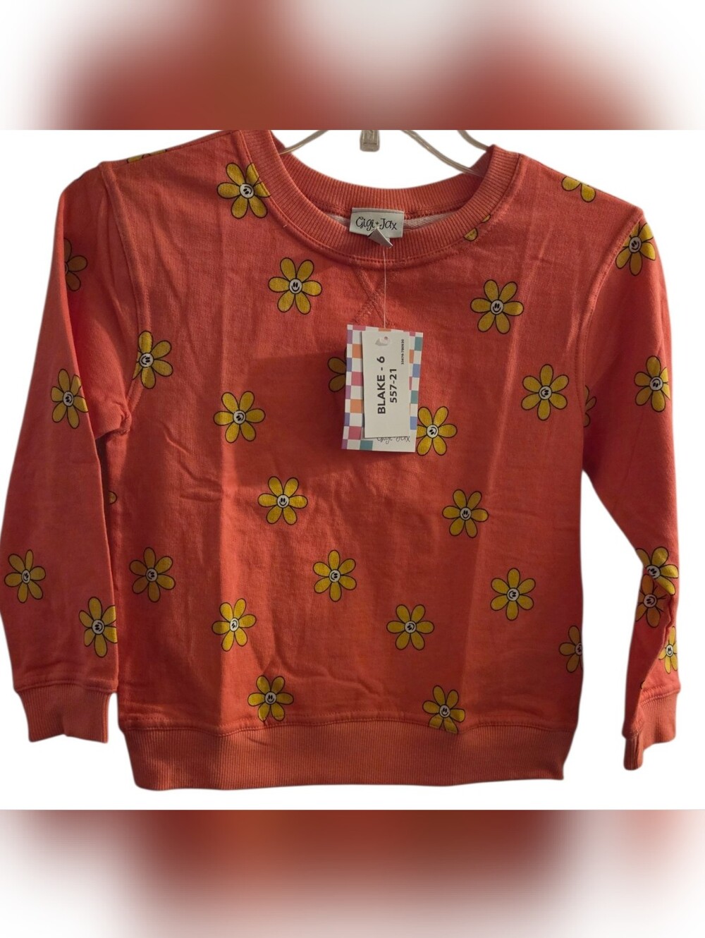 LuLaRoe Coral Sweatshirt with Yellow Daisy Print